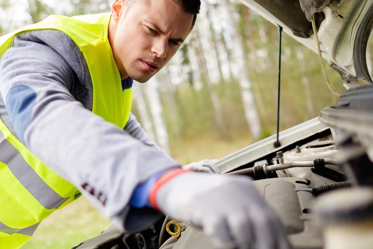 Mechanic making repairs by the side of the road